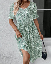 Laden Sie das Bild in den Galerie-Viewer, Elegantes Kleid mit Blumendruck und Rundhalsausschnitt