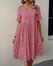 Laden Sie das Bild in den Galerie-Viewer, Elegantes Kleid mit Blumendruck und Rundhalsausschnitt