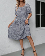 Laden Sie das Bild in den Galerie-Viewer, Elegantes Kleid mit Blumendruck und Rundhalsausschnitt