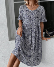 Laden Sie das Bild in den Galerie-Viewer, Elegantes Kleid mit Blumendruck und Rundhalsausschnitt